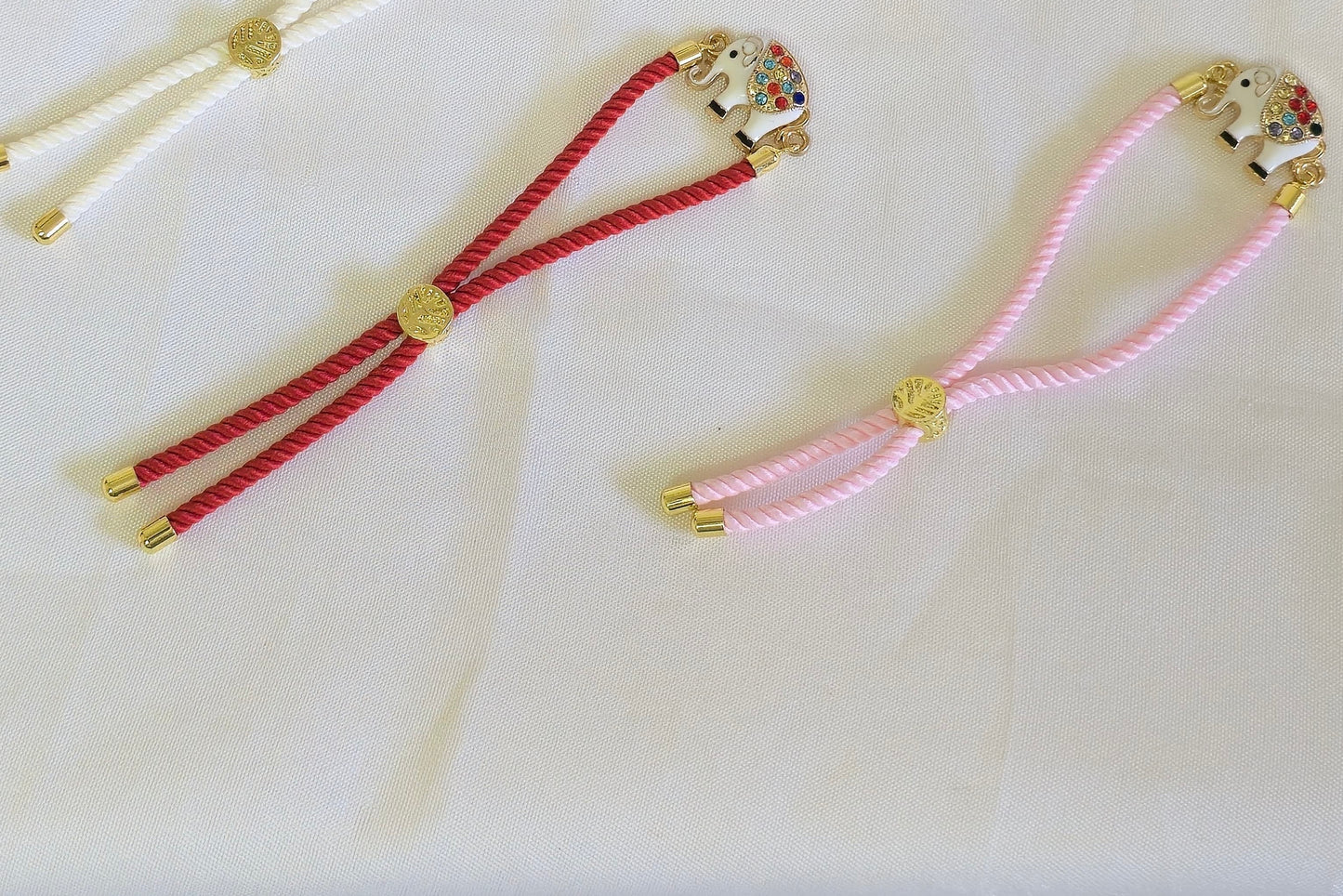 Multi Stone Hathi Rakhi Band